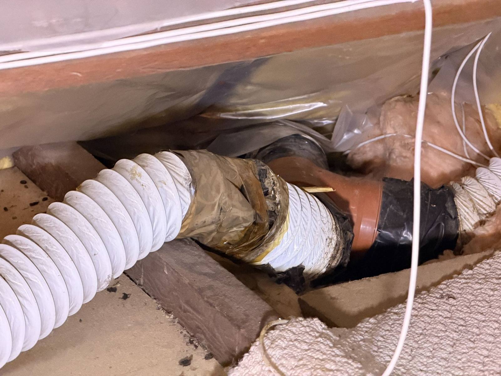 Bathroom extractor ducting in a roof void identified during a Birmingham Level 2 Home Survey